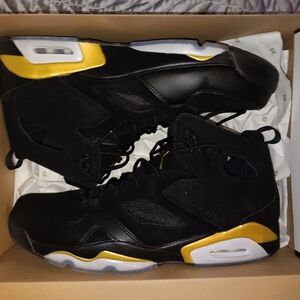 Jordan Black and Gold Athletic Shoes